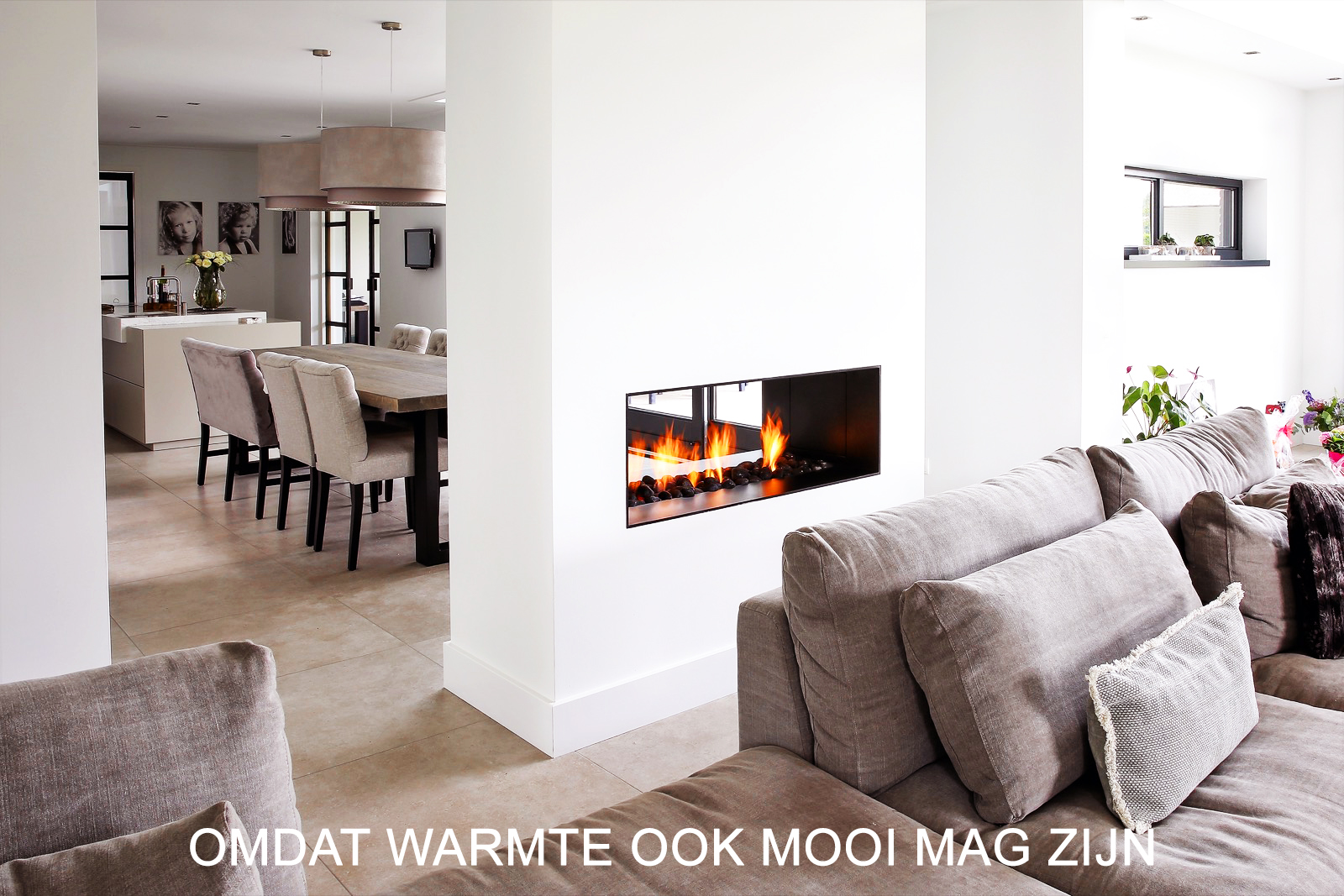 Elektrische doorkijkhaard tussen keuken en woonkamer
